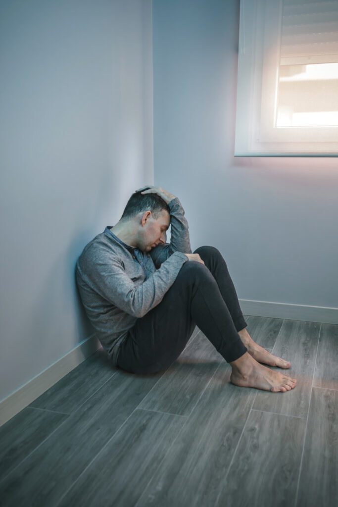Stressed and tired man with depression. Major Depressive Disorder (MDD), Persistent Depressive Disorder (Dysthymia), Seasonal Affective Disorder (SAD), Postpartum Depression, Bipolar Depression.
