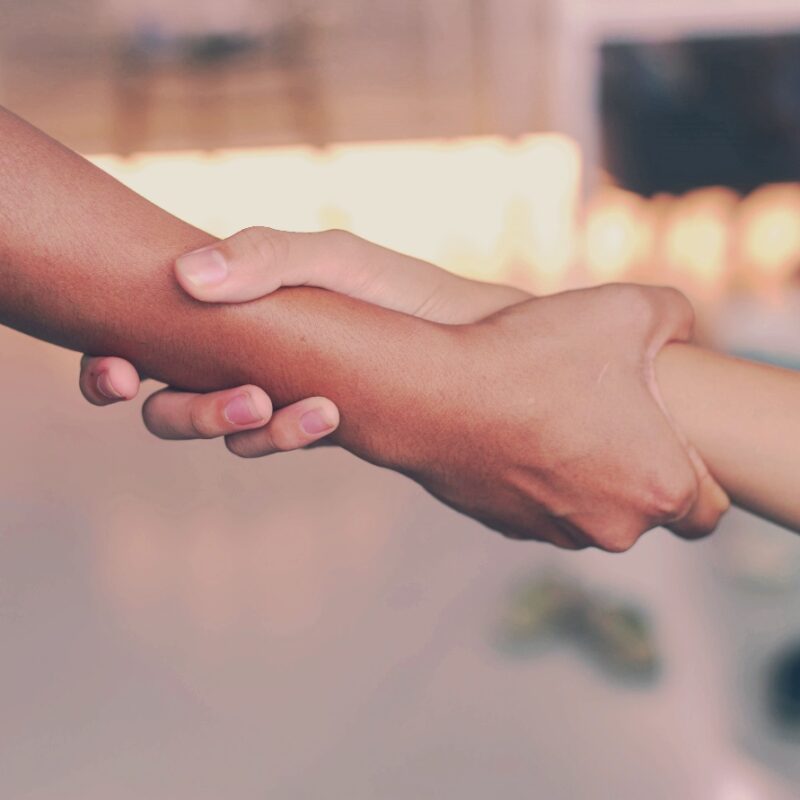 man holding friend's hand  how long does narcan last?