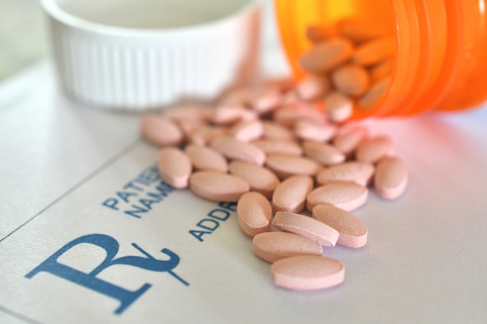 prescription opioids spilling out of bottle