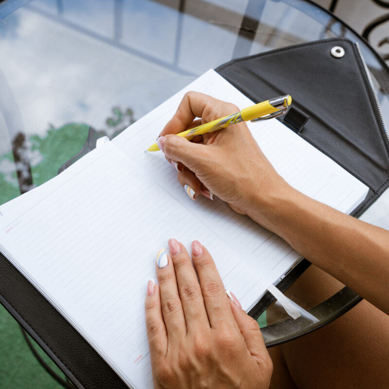 woman writes a relapse prevention plan
