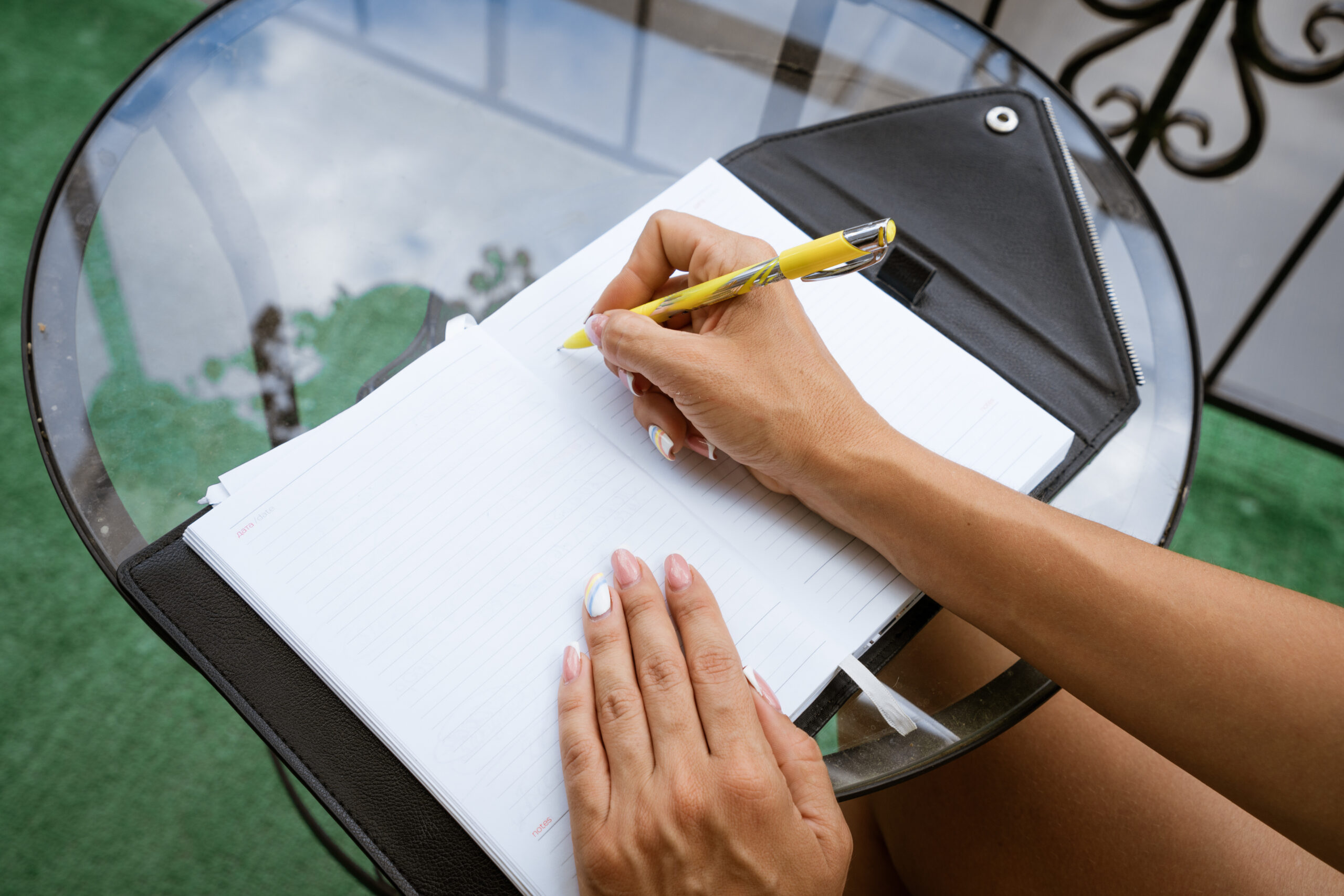 woman writes a relapse prevention plan