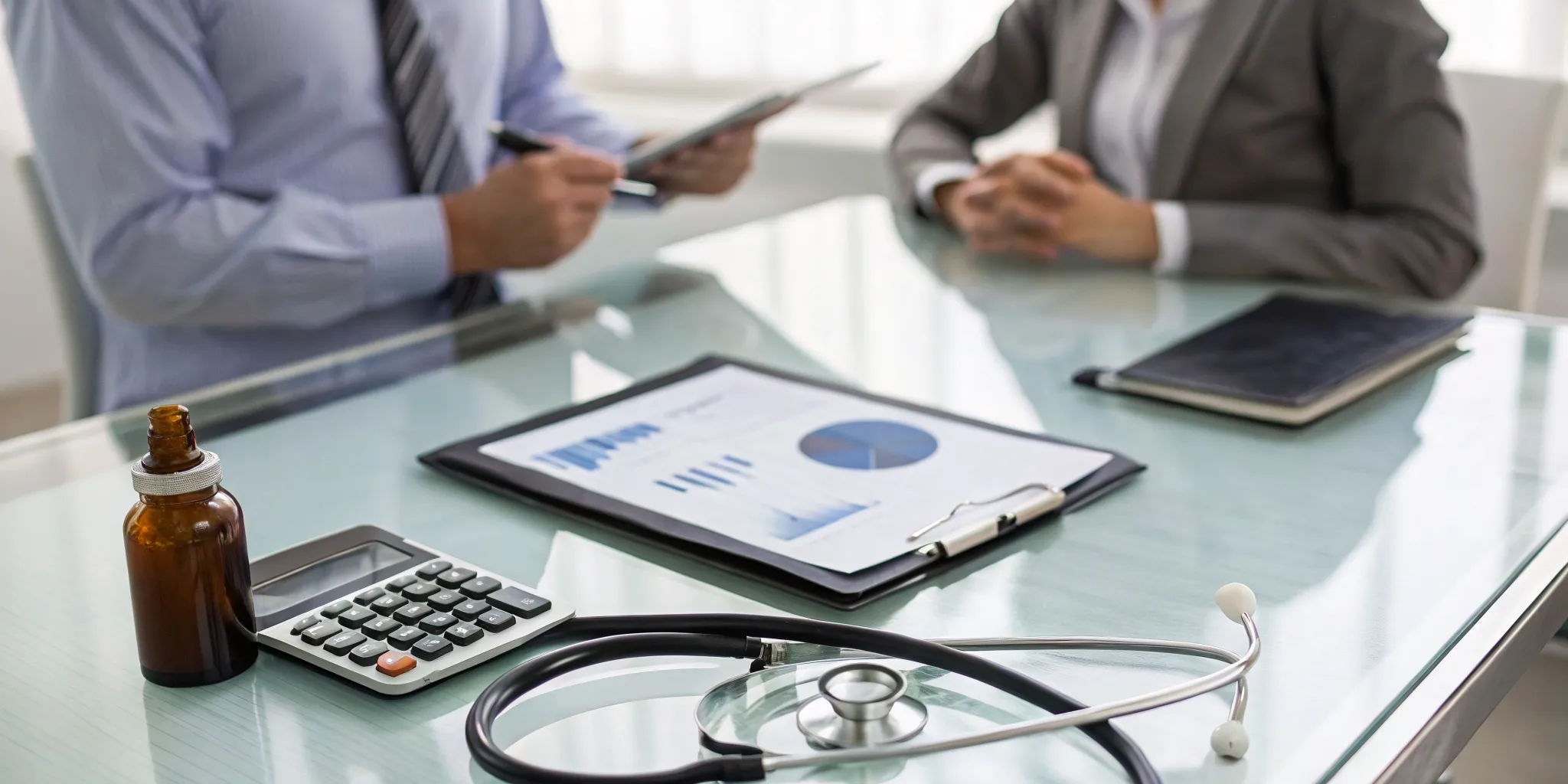 A medical professional uses a calculator to explain how much alcohol detox costs.